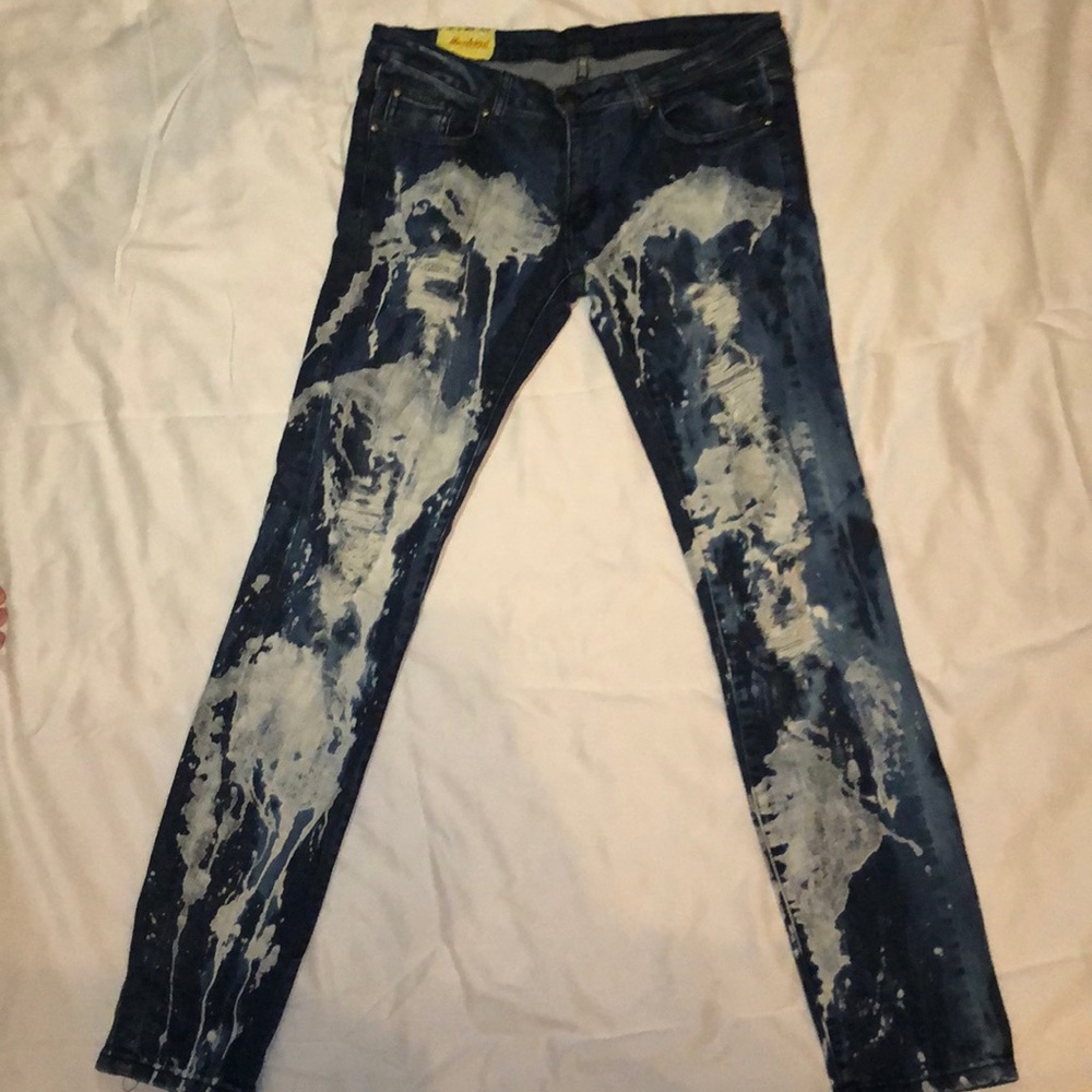 Machine paint splatter jeans.